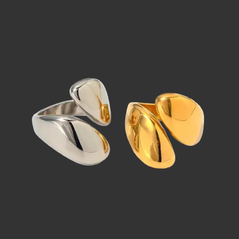 Gold and silver rings on a black background