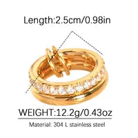 Gold ring with gemstones and measurement details on a white background