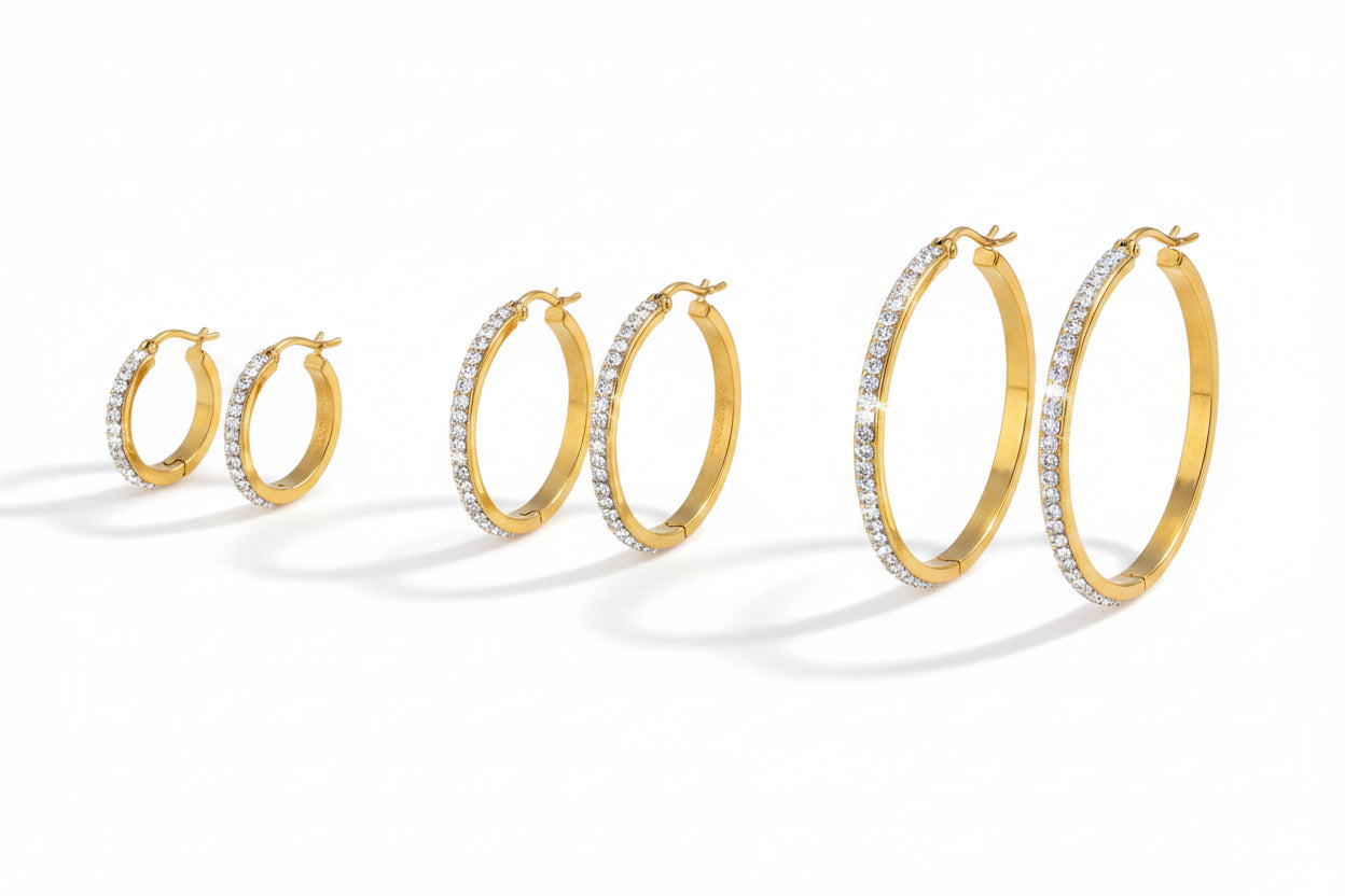 Set of 3 gold rhinestone hoops, small medium and large on white background with measurements