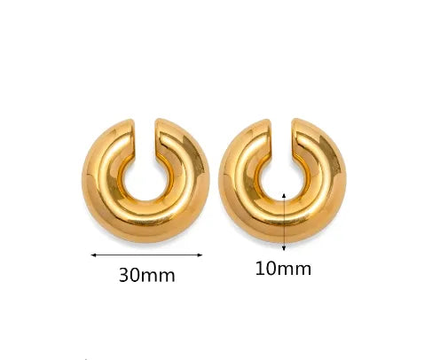 Set of large gold chunky ear cuffs on a white background with measurements