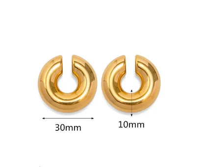 Set of large gold chunky ear cuffs on a white background with measurements