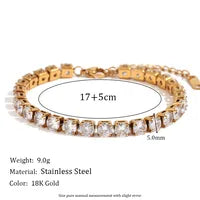 Gold bracelet with measurements and material details on a white background