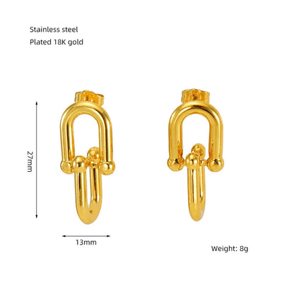Gold horseshoe buckle earrings with measurements and material details on a white background