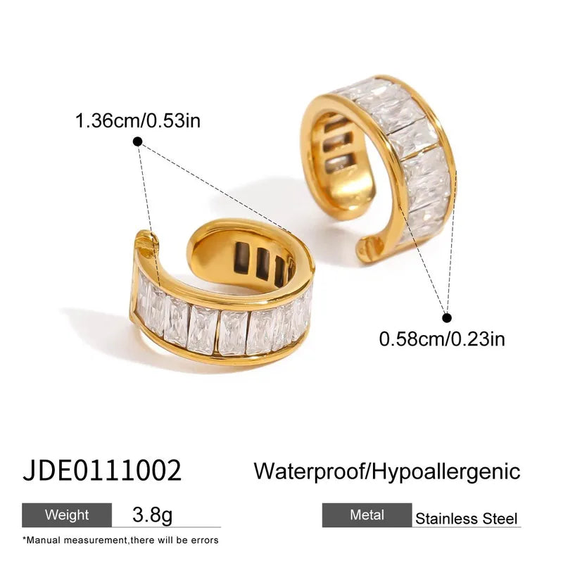 2 Gold ear cuffs with clear gemstones, showing measurements and material details on a white background.