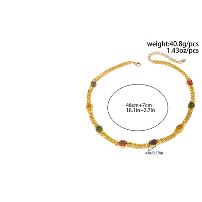 gold necklace with gemstones on white background with measurements