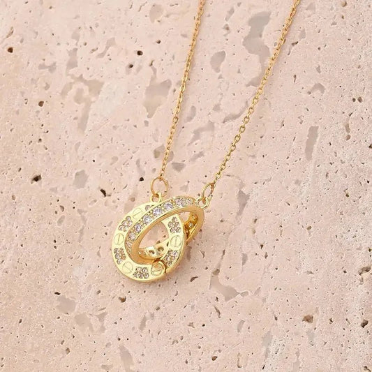 Gold double ring pendant necklace gift with embedded crystals on delicate chain