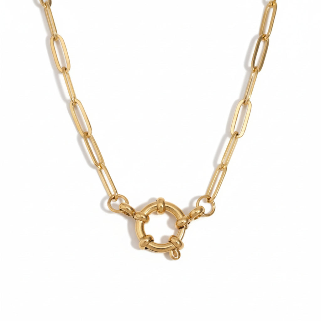 gold spring clasp pendant on paperclip link chain on white background