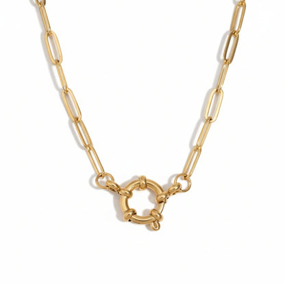gold spring clasp pendant on paperclip link chain on white background