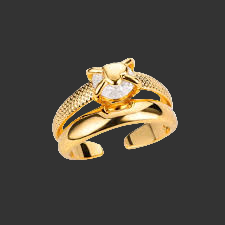 Gold ring with a heart-shape over gemstone on a black background