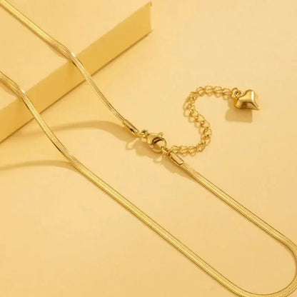 Men's gold plated necklace with adjustable chain and heart charm clasp by metal content