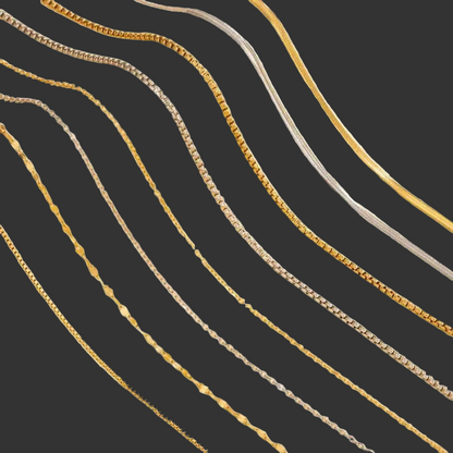 Gold and silver chain necklaces on a dark background