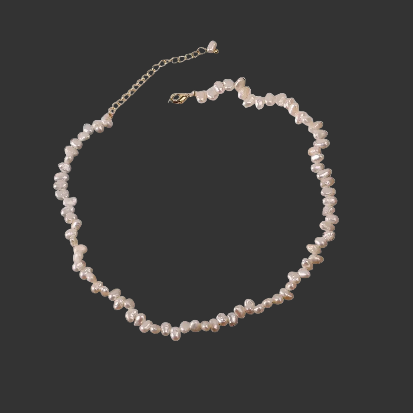 Pearl necklace on a black background