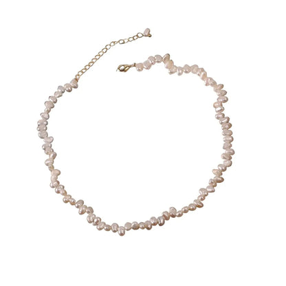 Women's pearl necklace with irregular white pearls and gold adjustable chain clasp from metal content