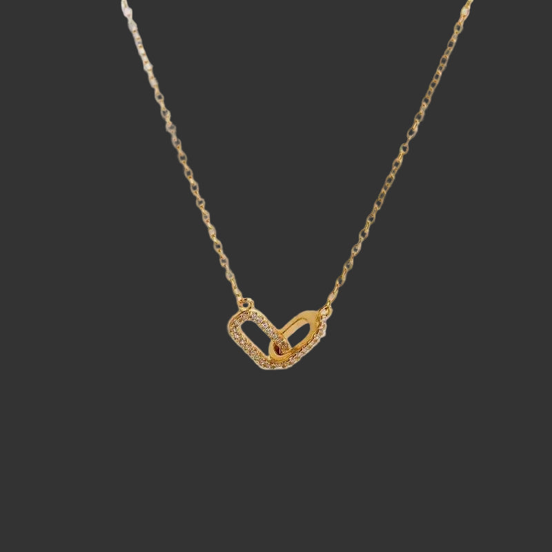 Women's Rhinestone Necklace 18K Gold Plated Stainless Steel with 2 Rhinestone Oval Links on black background