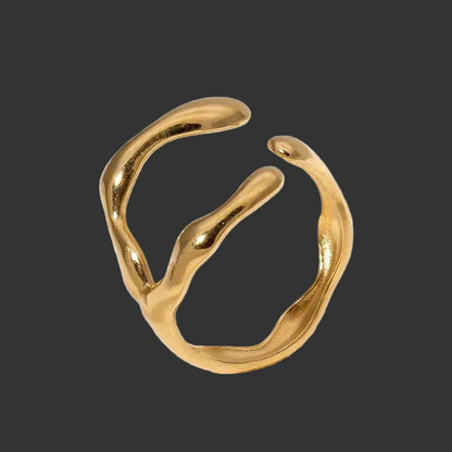 Gold ring with a 3 prong wrap open design on a black background